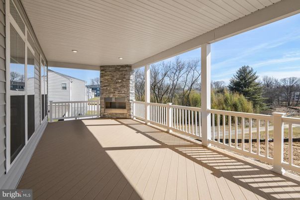 Exterior, Fireplace, Wood Texture Flooring