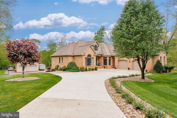 Attached, Backyard, Exterior, Facade, Brick Facade, French Provincial