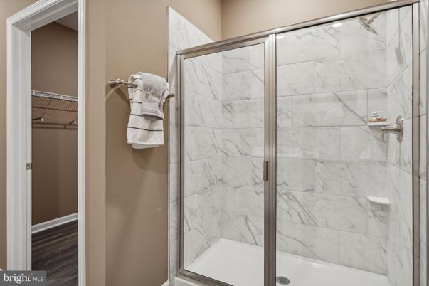 Bathroom, Glass Shower, Interior, Marble Walls, Wood Texture Flooring