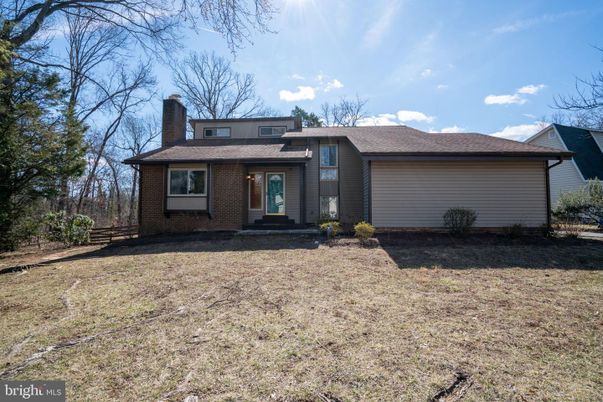 Attached, Backyard, Exterior, Facade, Brick Facade, Split Level