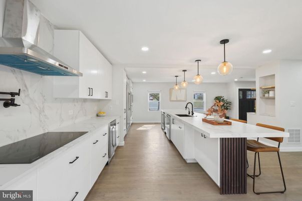 Interior, Kitchen, Marble Walls, Pendant Lights, Recessed Lighting, Wood Texture Flooring
