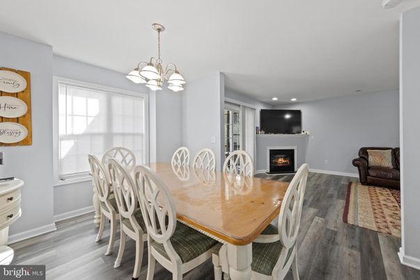 Chandelier, Dining room, Fireplace, Interior, Recessed Lighting, Wood Texture Flooring
