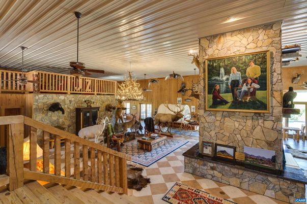Chandelier, Fireplace, Interior, Living room, Stone Walls