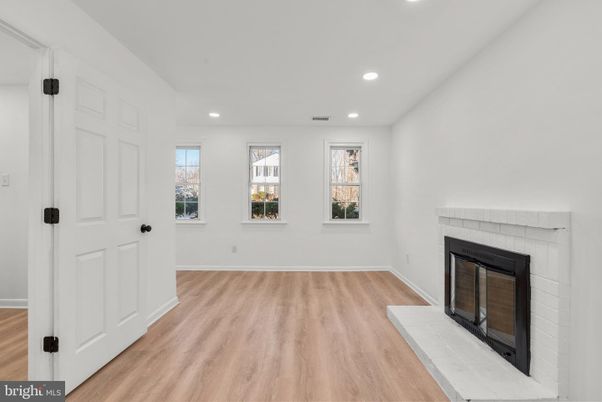 Empty room, Fireplace, Interior, Recessed Lighting, Wood Texture Flooring