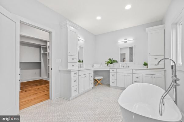 Bathroom, Dual Sink Vanities, Free Standing Baths, Interior, Recessed Lighting, Wood Texture Flooring