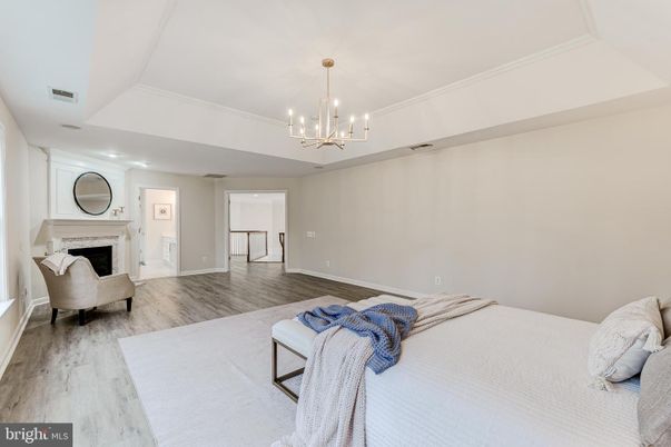 Bedroom, Fireplace, Interior, Pendant Lights, Wood Texture Flooring