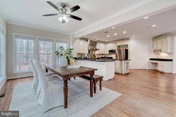 Dining room, Interior, Kitchen, Recessed Lighting, Stainless Steel Appliances, Wood Texture Flooring