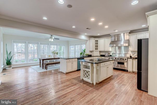 Dining room, Interior, Kitchen, Recessed Lighting, Stainless Steel Appliances, Wood Texture Flooring