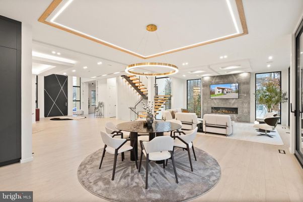 Dining room, Fireplace, Interior, Living room, Pendant Lights, Recessed Lighting, Wood Texture Flooring