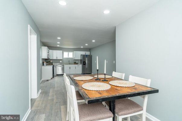 Dining room, Interior, Kitchen, Recessed Lighting, Stainless Steel Appliances, Wood Texture Flooring