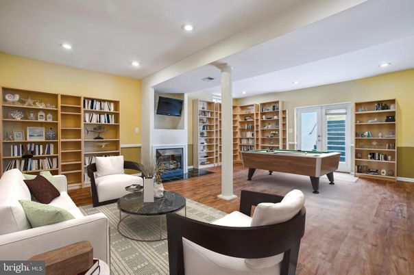 Billiard Table, Fireplace, Game Room, Interior, Living room, Recessed Lighting, Wood Texture Flooring