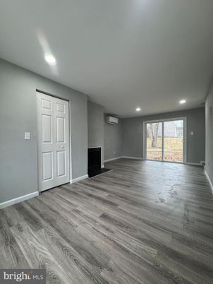 Empty room, Fireplace, Interior, Recessed Lighting, Wood Texture Flooring
