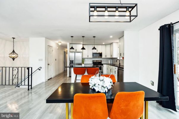 Dining room, Interior, Kitchen, Pendant Lights, Recessed Lighting, Stainless Steel Appliances, Wood Texture Flooring