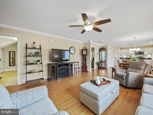 Dining room, Fireplace, Interior, Kitchen, Living room, Pendant Lights, Recessed Lighting, Stainless Steel Appliances, Wood Texture Flooring
