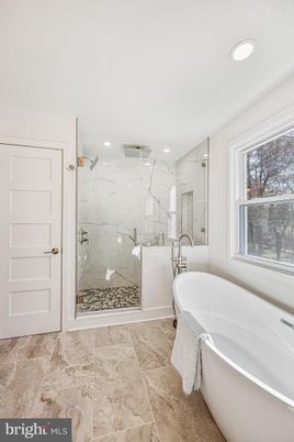 Bathroom, Free Standing Baths, Glass Shower, Interior, Marble Walls, Recessed Lighting