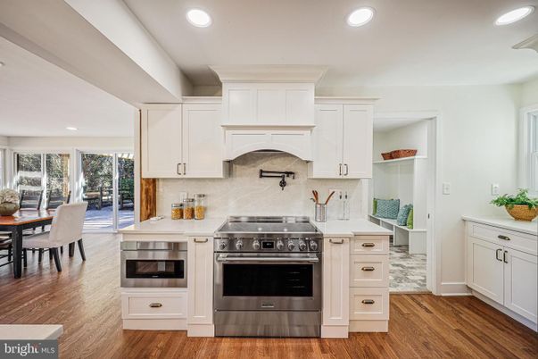 Dining room, Interior, Kitchen, Recessed Lighting, Stainless Steel Appliances, Wood Texture Flooring