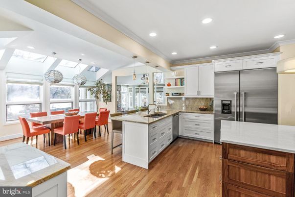 Dining room, Interior, Kitchen, Pendant Lights, Recessed Lighting, Stainless Steel Appliances, Wood Texture Flooring