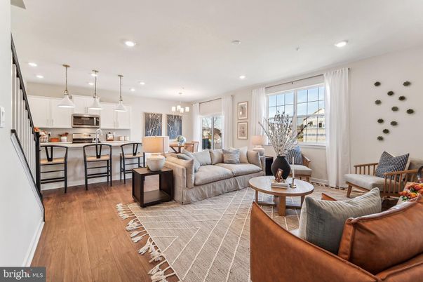 Chandelier, Dining room, Interior, Kitchen, Living room, Pendant Lights, Recessed Lighting, Stainless Steel Appliances, Wood Texture Flooring