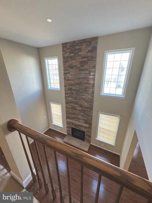 Fireplace, Interior, Recessed Lighting, Stone Walls, Wood Texture Flooring
