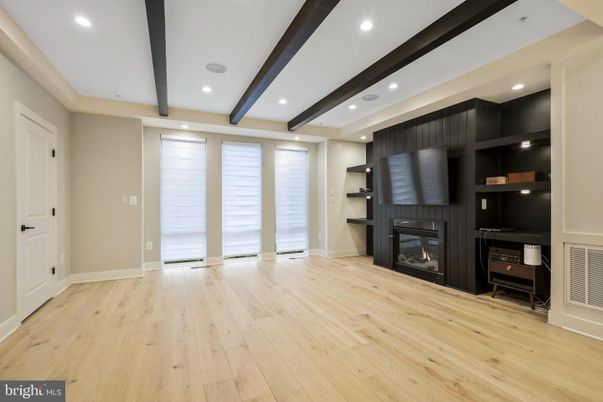 Empty room, Fireplace, Interior, Recessed Lighting, Wooden Beams, Wood Texture Flooring