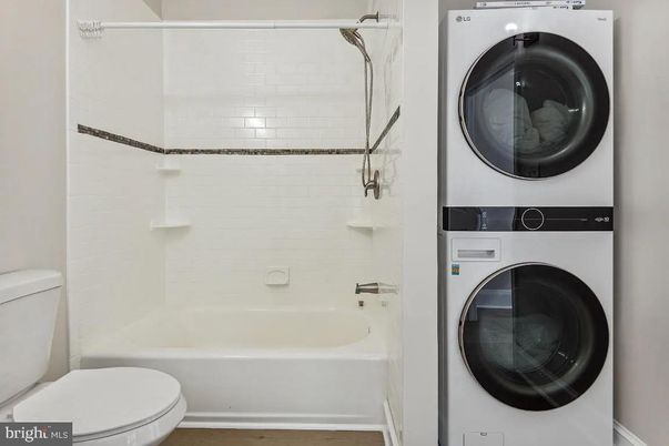 Bathroom, Interior, Utility Closets, Washer, Wood Texture Flooring