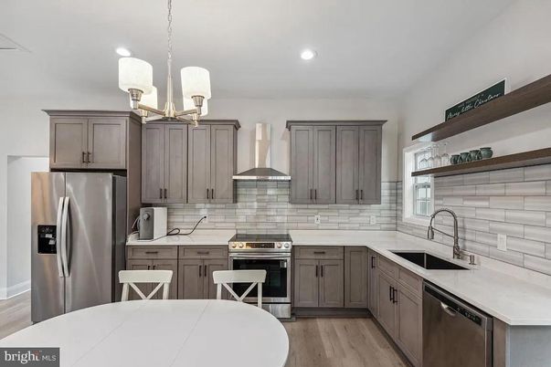 Chandelier, Interior, Kitchen, Pendant Lights, Recessed Lighting, Stainless Steel Appliances, Wood Texture Flooring