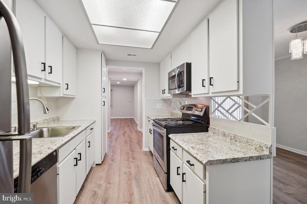 Chandelier, Interior, Kitchen, Recessed Lighting, Stainless Steel Appliances, Wood Texture Flooring