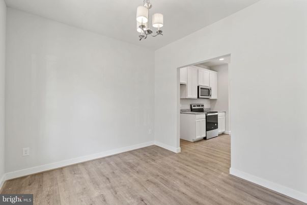 Chandelier, Empty room, Interior, Kitchen, Recessed Lighting, Wood Texture Flooring