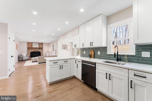 Fireplace, Interior, Kitchen, Living room, Recessed Lighting, Stone Walls, Wood Texture Flooring