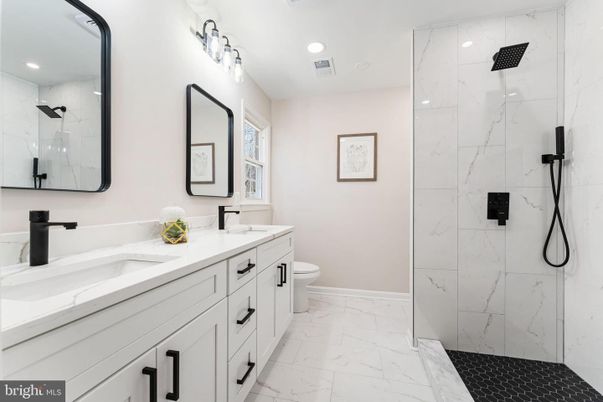 Bathroom, Dual Sink Vanities, Glass Shower, Interior, Marble, Marble Walls, Recessed Lighting