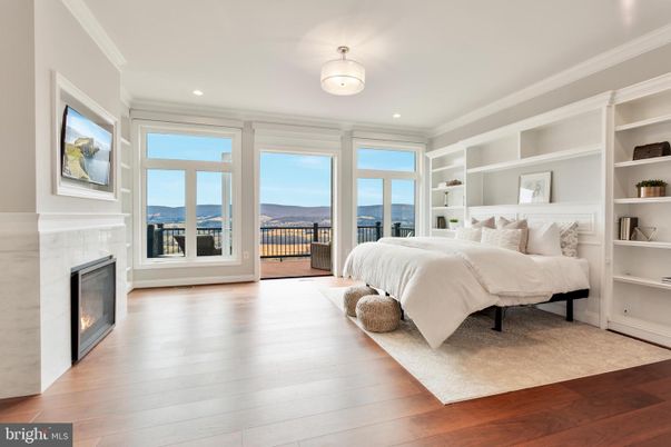Bedroom, Fireplace, Interior, Recessed Lighting, Wood Texture Flooring