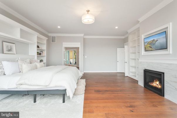 Bedroom, Fireplace, Interior, Recessed Lighting, Wood Texture Flooring