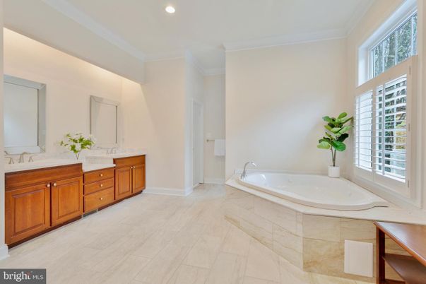 Bathroom, Dual Sink Vanities, Interior, Recessed Lighting, Wood Texture Flooring