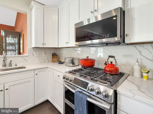 Interior, Kitchen, Marble Walls, Stainless Steel Appliances, Wood Texture Flooring