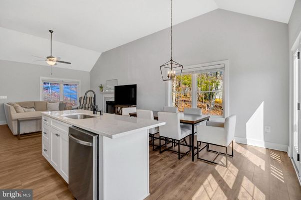 Dining room, Fireplace, Interior, Kitchen, Living room, Pendant Lights, Wood Texture Flooring