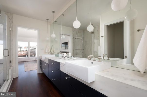 Bathroom, Dual Sink Vanities, Glass Shower, Interior, Pendant Lights, Wood Texture Flooring