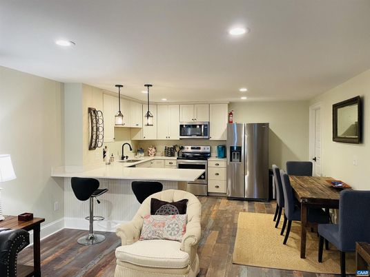 Dining room, Interior, Kitchen, Pendant Lights, Recessed Lighting, Stainless Steel Appliances, Wood Texture Flooring