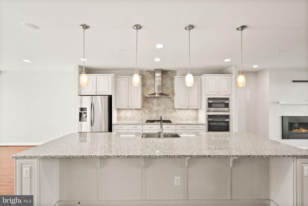 Fireplace, Interior, Kitchen, Pendant Lights, Recessed Lighting, Stainless Steel Appliances