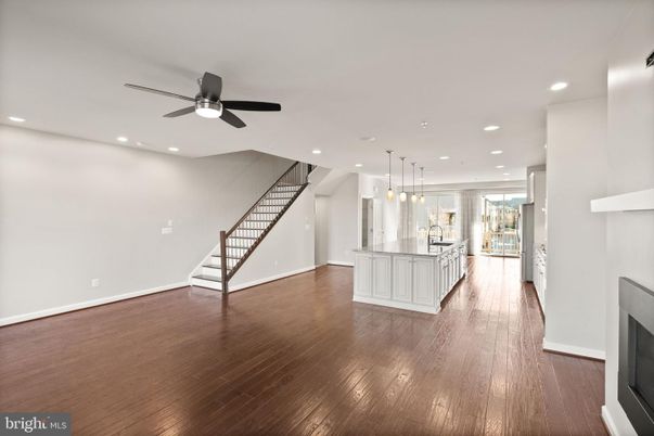 Fireplace, Interior, Kitchen, Pendant Lights, Recessed Lighting, Wood Texture Flooring
