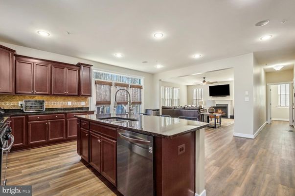 Fireplace, Interior, Kitchen, Living room, Recessed Lighting, Wood Texture Flooring