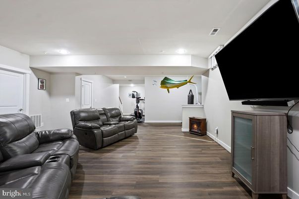 Fireplace, Fitness Equipment, Interior, Recessed Lighting, Wood Texture Flooring