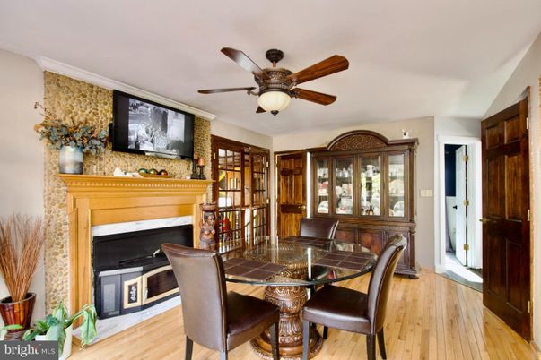 Dining room, Fireplace, Interior, Wood Texture Flooring