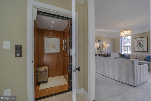 Chandelier, Elevator, Interior, Living room, Recessed Lighting, Wooden Walls