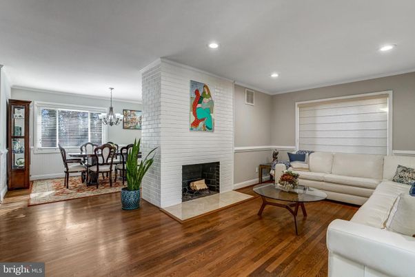 Chandelier, Dining room, Fireplace, Interior, Living room, Recessed Lighting, Stone Walls, Wood Texture Flooring