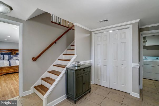 Bedroom, Interior, Recessed Lighting, Washer, Wood Texture Flooring