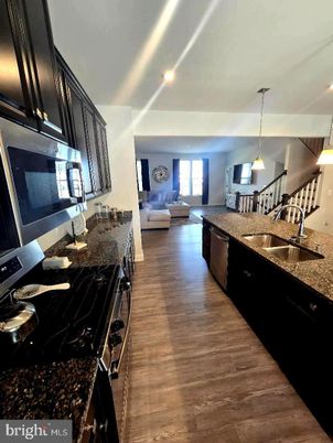 Interior, Kitchen, Living room, Pendant Lights, Recessed Lighting, Stainless Steel Appliances, Wood Texture Flooring