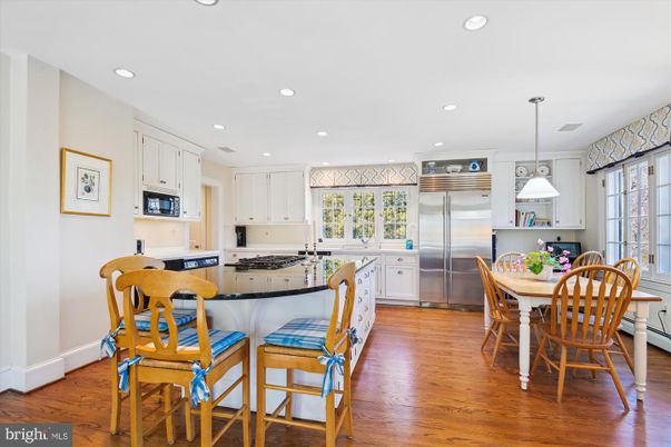 Dining room, Interior, Kitchen, Pendant Lights, Recessed Lighting, Stainless Steel Appliances, Wood Texture Flooring