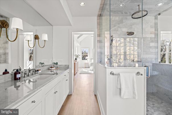 Bathroom, Dual Sink Vanities, Glass Shower, Interior, Recessed Lighting, Wood Texture Flooring