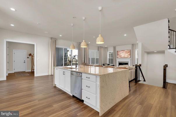 Fireplace, Interior, Kitchen, Pendant Lights, Recessed Lighting, Stainless Steel Appliances, Wood Texture Flooring