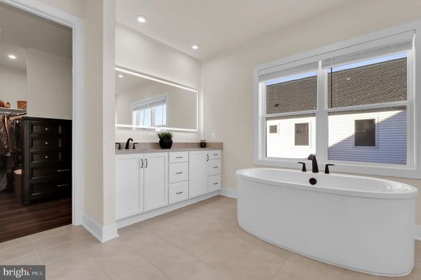Bathroom, Dual Sink Vanities, Free Standing Baths, Interior, Recessed Lighting, Wood Texture Flooring